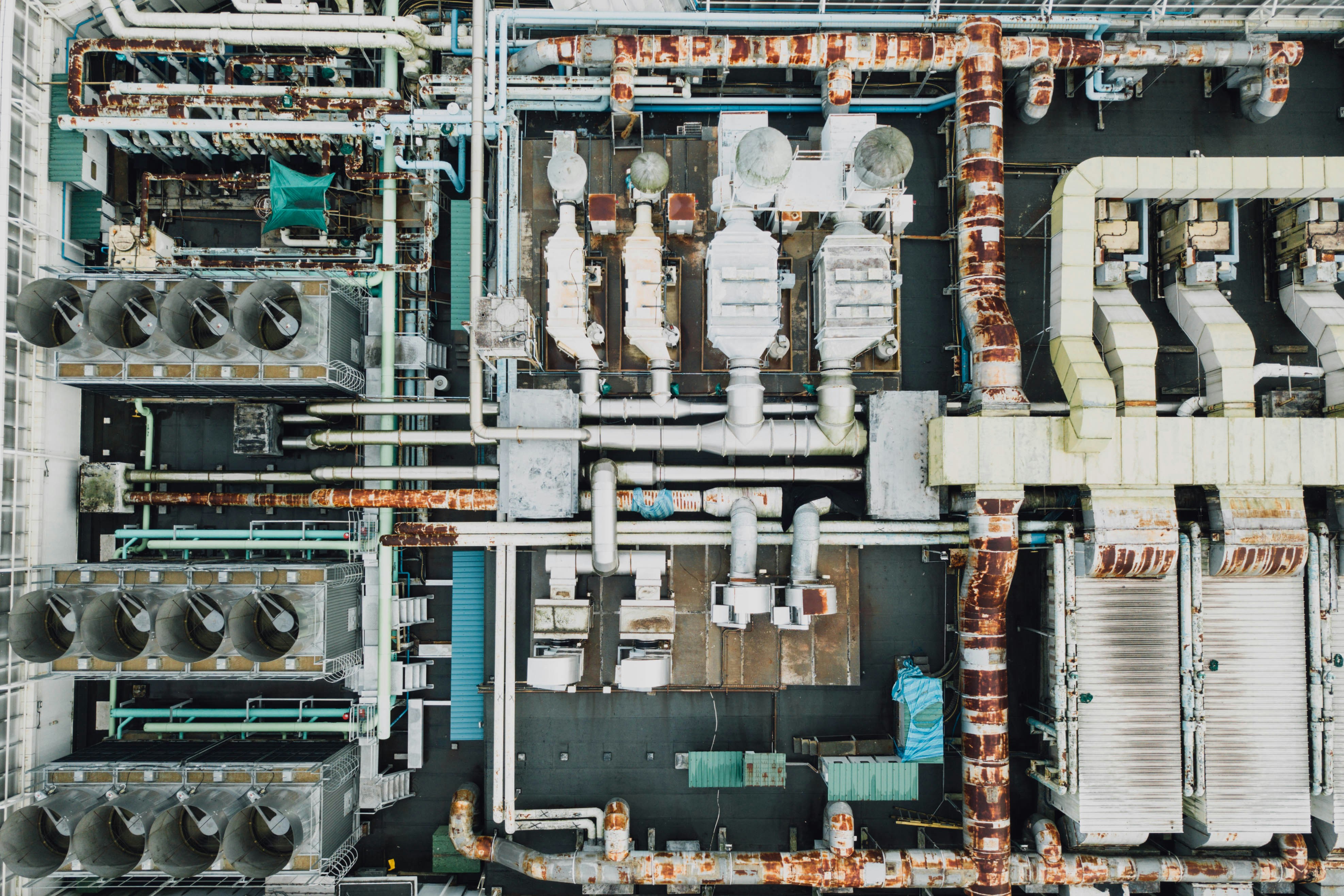 Industrial Services — engineer servicing heavy machinery